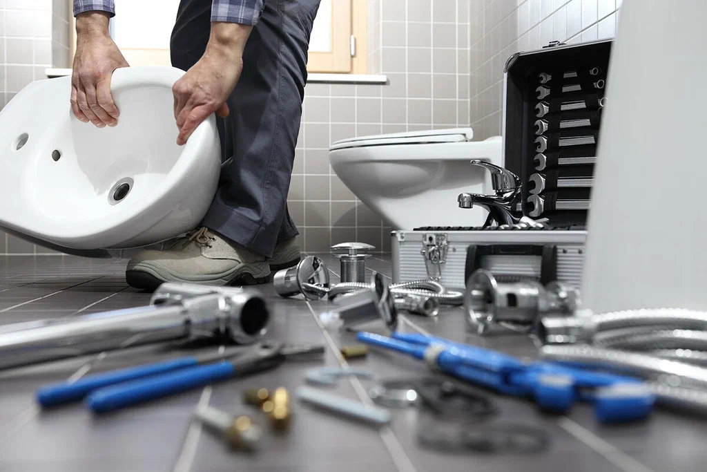 Plumbing tools prepared for a bathroom repair in West Jordan